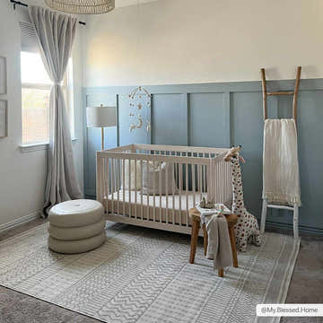 Neutral nursery with a crib on a Lascassas Neutral Area Rug, featuring a subtle bohemian pattern. Roomscene-Rectangle