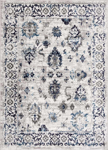 Close-up of the Duena Area Rug: traditional oriental design in blue and light gray, machine woven texture. Design-Rectangle-46
