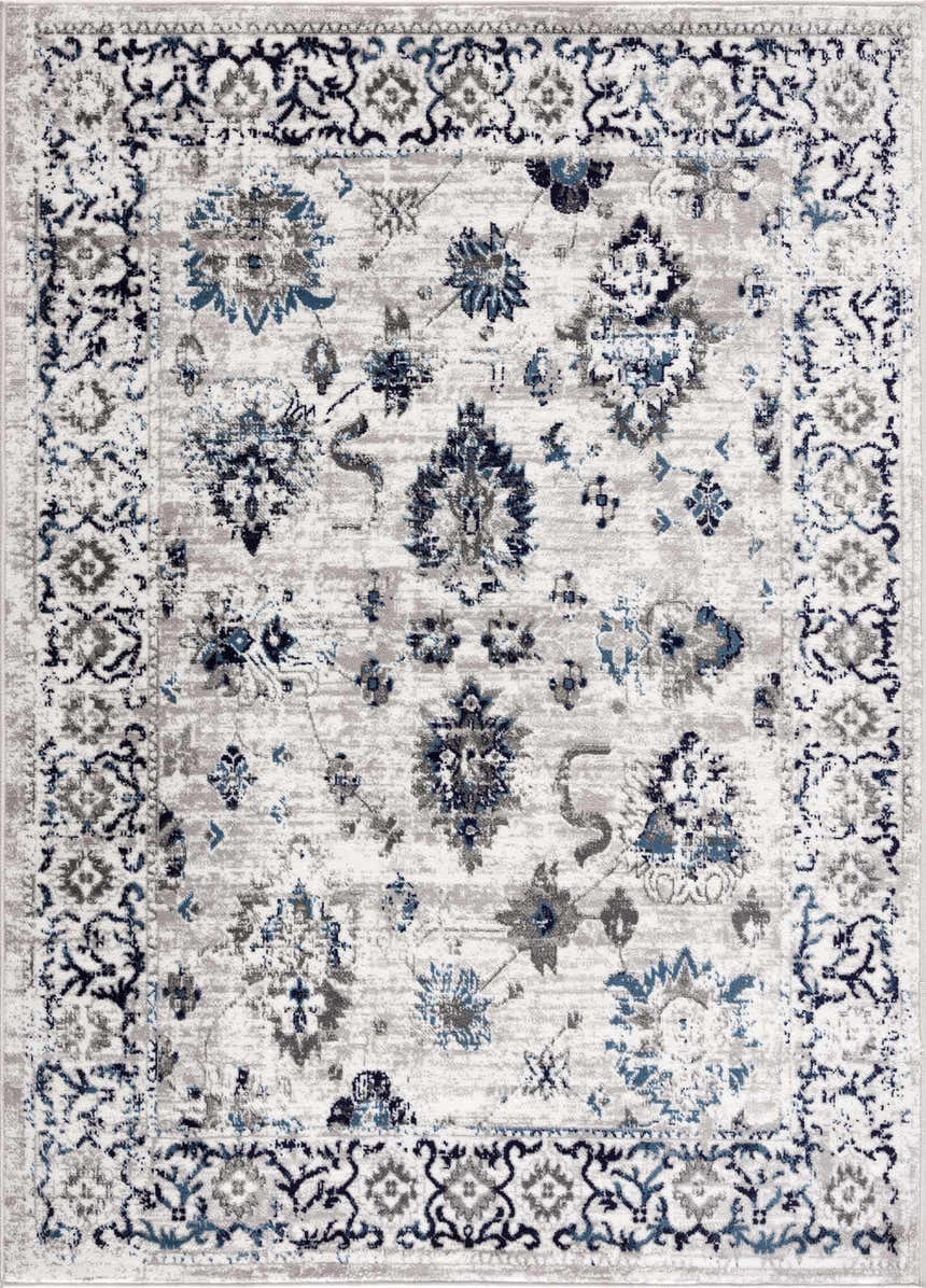 Close-up of the Duena Area Rug: traditional oriental design in blue and light gray, machine woven texture. Design-Rectangle-46