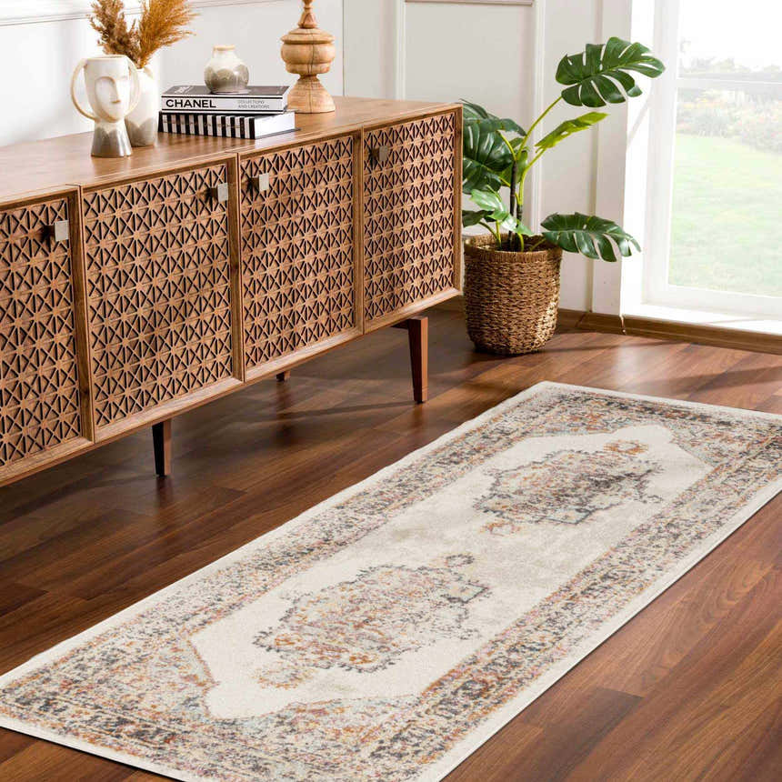 Entryway with a beige Hillcrest Area Rug runner, wood console table, and monstera plant. Roomscene-Runner