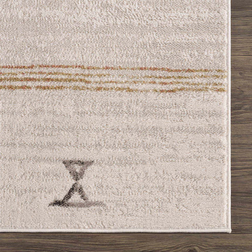 Close-up of the Deja Cream & Gold Area Rug showing its cream color, gold accents, and geometric design. Swatch