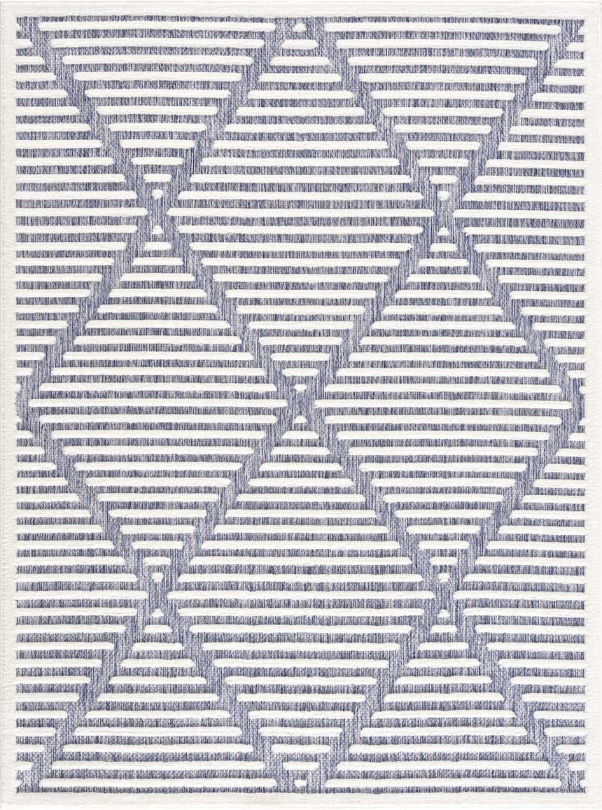 Close-up of the Anah Blue Outdoor Rug. Features a geometric diamond pattern in denim blue and off-white. Contemporary style. Design-Rectangle-537