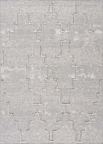 Close-up of the Butch Area Rug in bone and taupe, featuring a geometric, textured design. Design-Rectangle-46