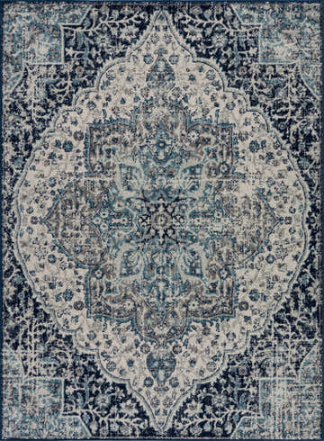 Close-up of the Marash KMRSH-4602 area rug. Features a traditional, bohemian design in gray, ivory, navy, and turquoise. Design-Rectangle