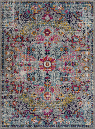 Detailed view of the Delanson Colorful Area Rug, a vintage-style rug with teal, orange, pink, and gray floral motifs. Design-Rectangle