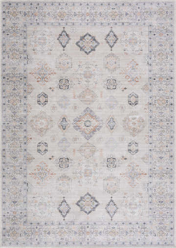 Close-up of Beige Beckett Washable Rug with a traditional, vintage-inspired pattern in beige, blue, and brick red. Design-Rectangle