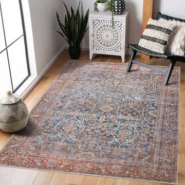 Living room scene with Rust Mair Traditional Washable Area Rug in blue, rust, and brown tones. Farmhouse style. Roomscene-Rectangle