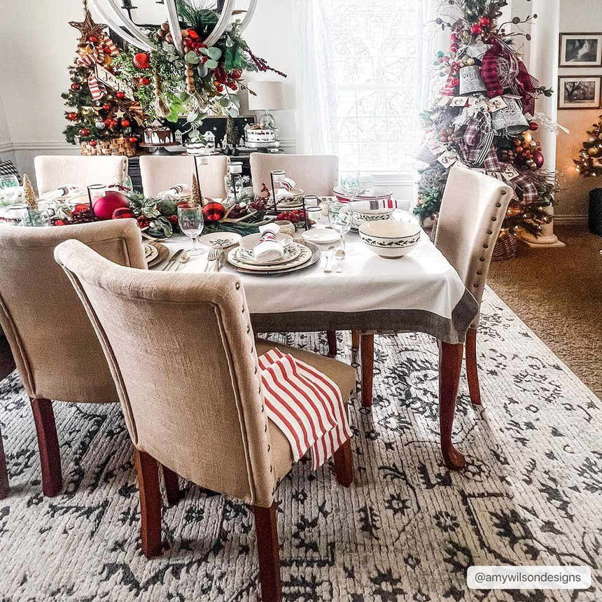 Christmas dining room with Willowbrook Area Rug in charcoal and beige, beige chairs, and holiday decor. Roomscene-Rectangle