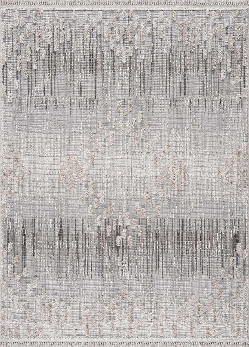 Close-up of the Poydras High-Low Rustic Rug. Features a textured, abstract pattern in charcoal, gray, and light beige tones. Design-Rectangle-537