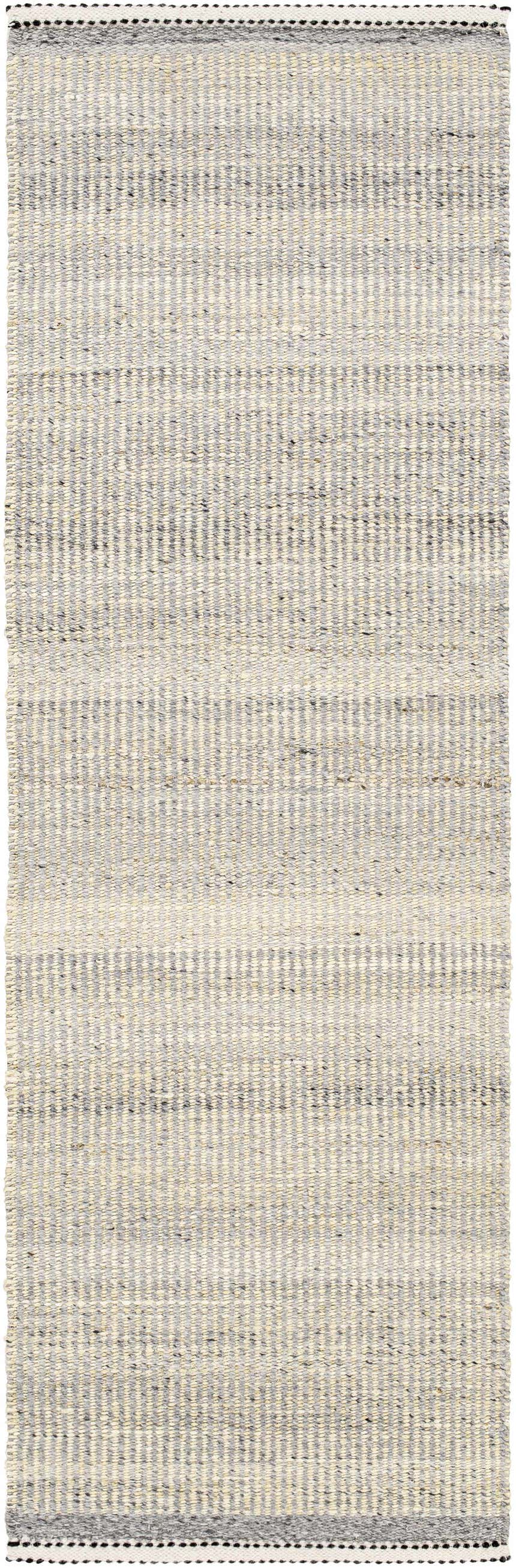 Close-up of the Abucay Jute Rug. Hand-woven rug with charcoal, cream, light beige, and light gray stripes. Jute and wool texture. Design-Runner-268