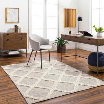 Contemporary home office with Adora Area Rug in bone and gray, wood desk, and gray chair. Roomscene-Rectangle