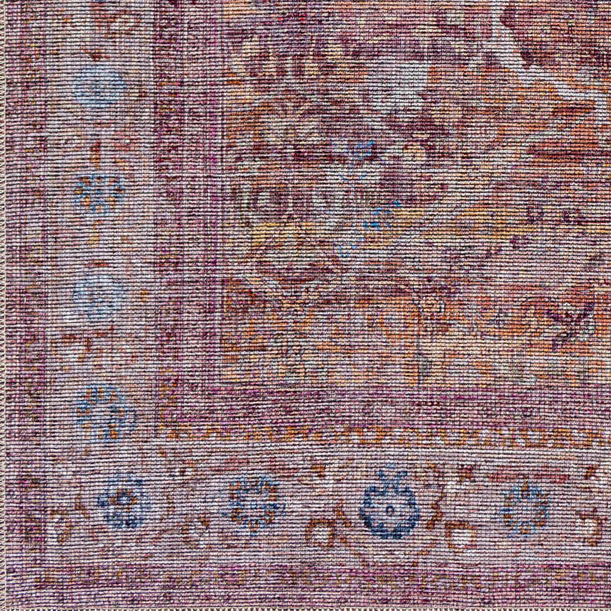 Close-up of the Alcoy Washable Area Rug. Features dark purple, brown, pink, and white thatch colors in an oriental pattern. Swatch