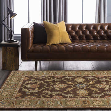 Living room scene with brown leather couch and Alexander Brown Regency Wool Carpet. Traditional, oriental style. Roomscene-Rectangle