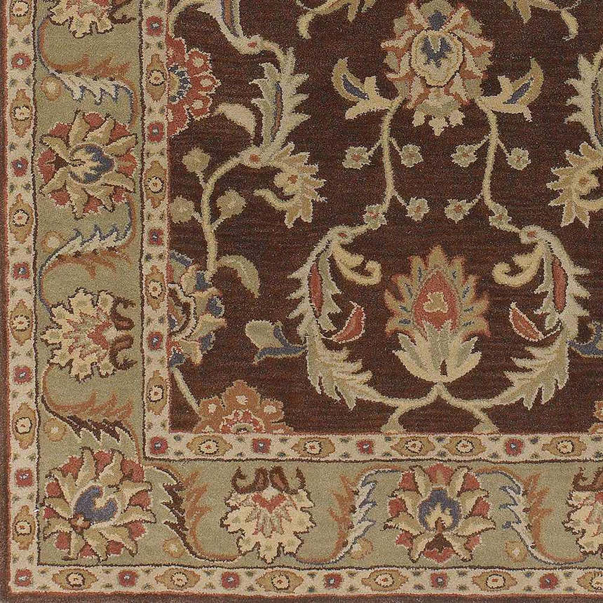 Detailed close-up of the Alexander Brown Regency Wool Carpet. Features a brown, floral oriental pattern with beige and olive accents. Swatch