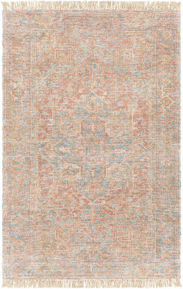 Close-up of the hand-woven Atulayan Premium Rug. Bohemian style rug with blue, coral, and red tones and fringe detail. Design-Rectangle-576