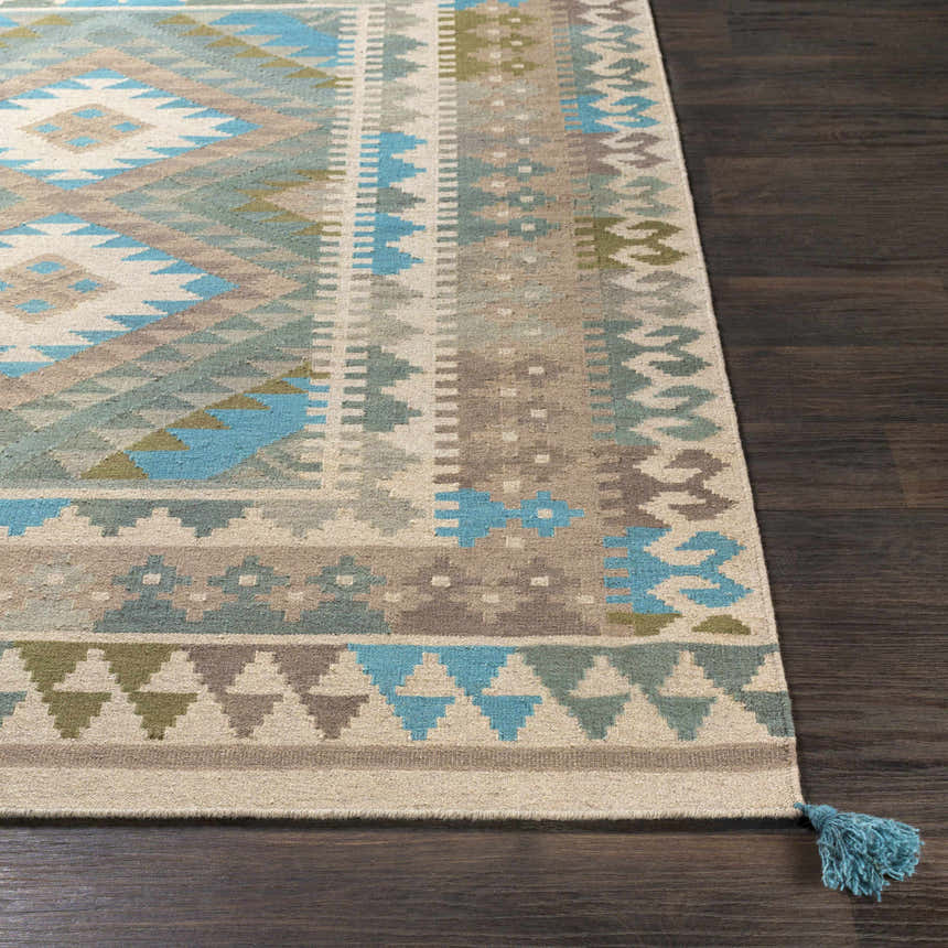 Close up of Auchterarder Carpet. Hand woven wool rug with aqua, blue, sage, and brown geometric pattern. Farmhouse style. Front