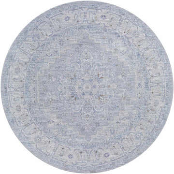 Close-up of the round Earlsfield rug. Luxe statement rug in blue, gray, and white with an oriental pattern. Design-Round