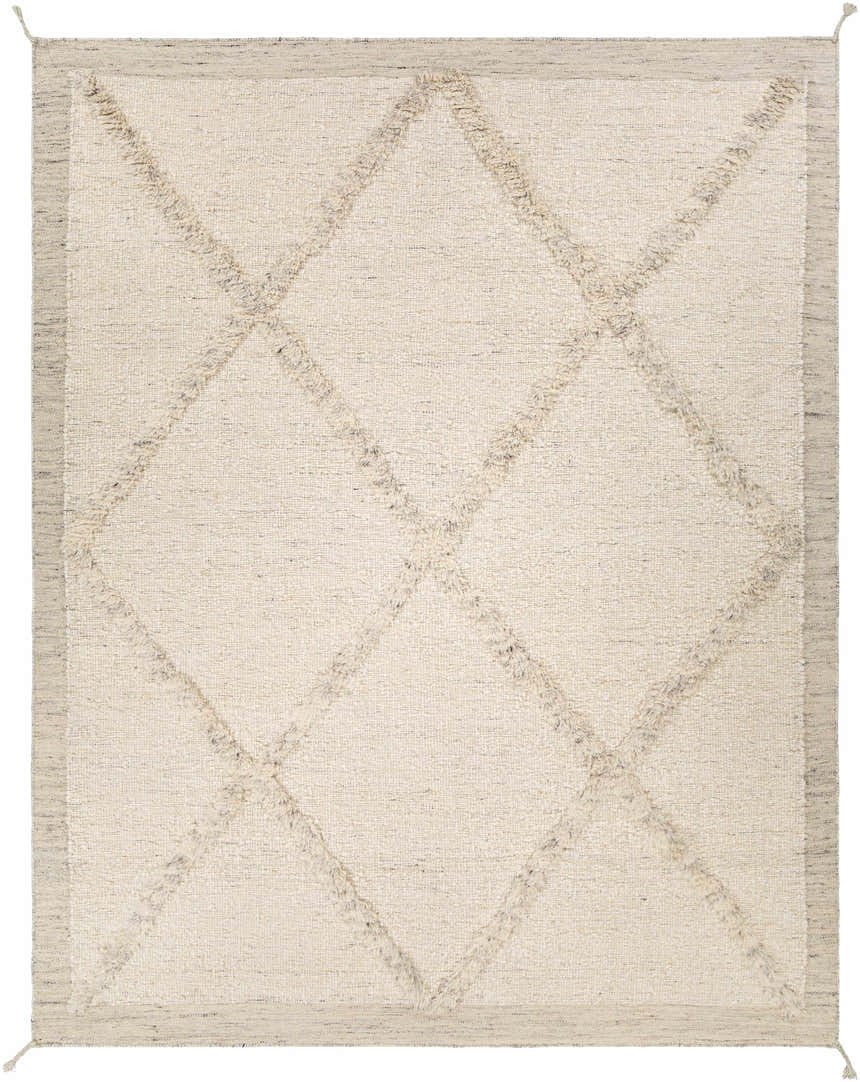 Close-up of the Awen Hand Knotted Wool Area Rug. Beige rug with charcoal diamond pattern and fringe texture. Bohemian style. Design-Rectangle-810