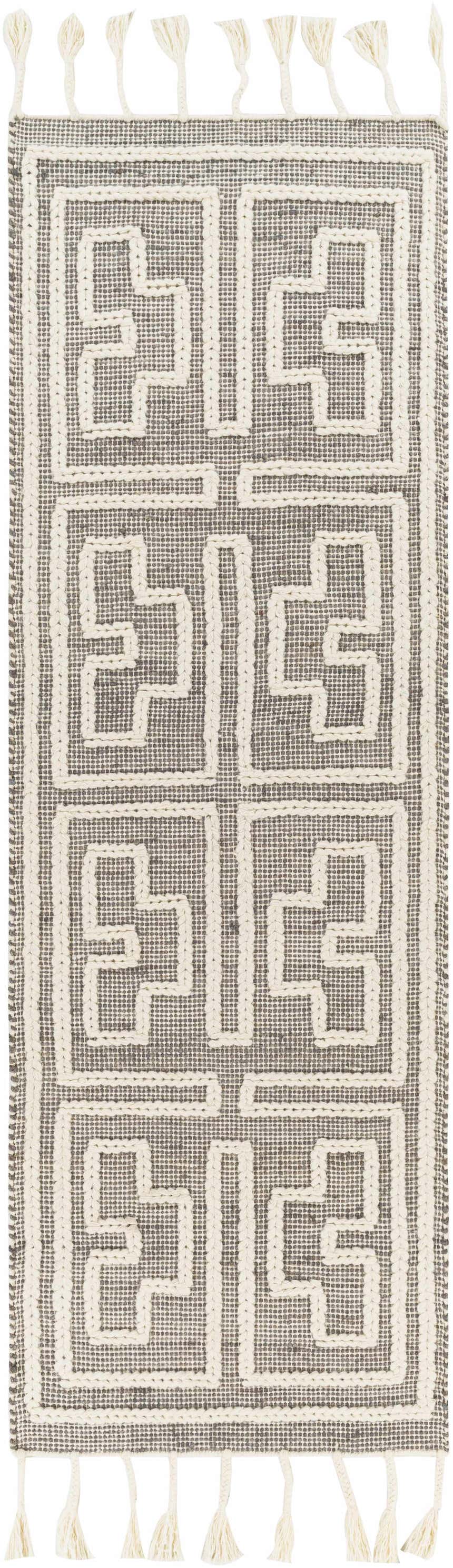 Close-up of the Azra Tasseled Jute&Wool Rug in charcoal and cream, featuring a geometric pattern and tasseled edges. Design-Runner-268