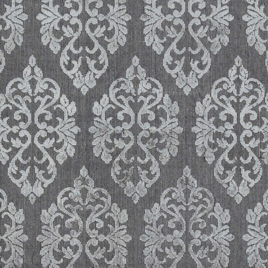 Close-up of the Barclay Carpet, a gray rug with a repeating, ornate damask pattern. Hand-knotted texture detail. Swatch