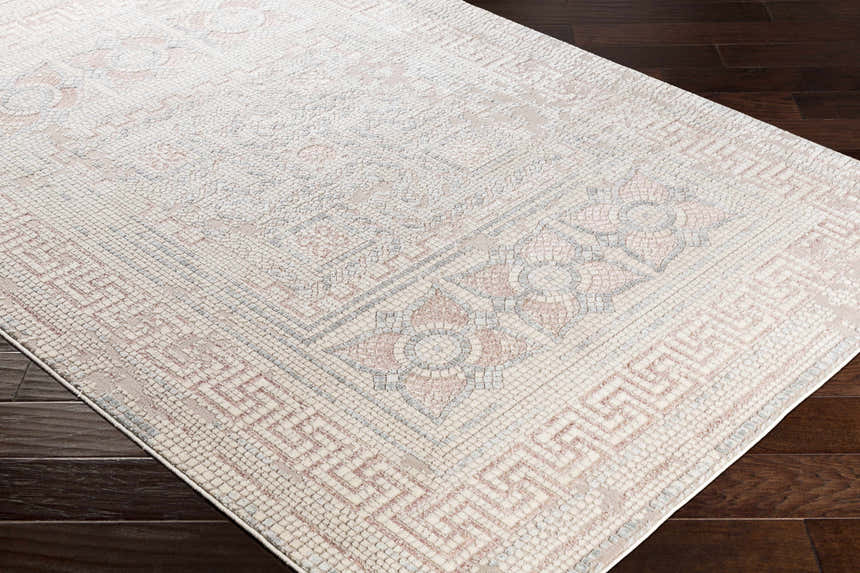 Close-up of the Terlingua Blush Greek Mosaic Carpet, showcasing its geometric pattern and blush, tan, and slate color palette. Corner