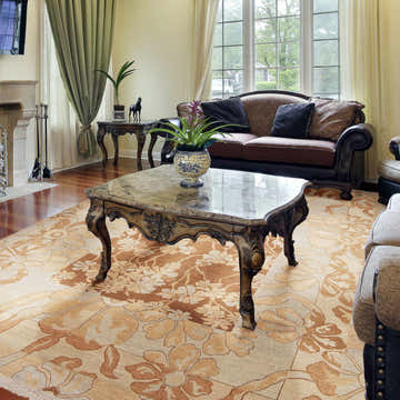 Living room scene with a camel and brown floral Bayberry Area Carpet, traditional style. Roomscene-Rectangle