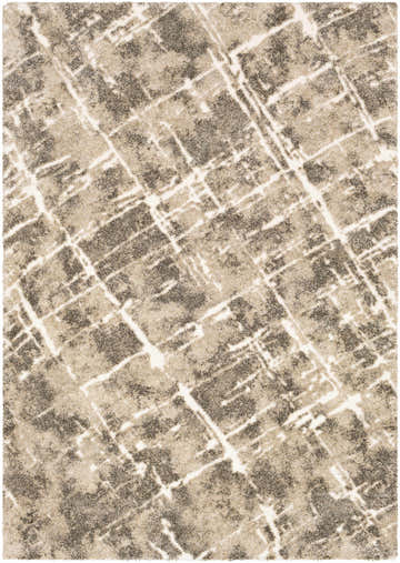 Close-up of the Bearsdale Abstract Thick Rug. Features a dark brown, light beige, and white geometric pattern. Design-Rectangle-5373