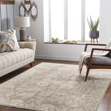 Living room scene with a beige sofa and the Beldon Area Rug in gray, light beige, and taupe. Roomscene-Rectangle