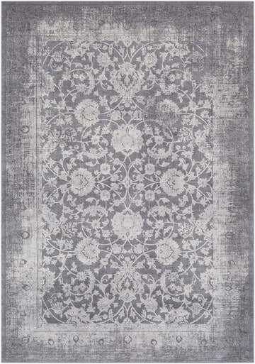 Close-up of the Benavides Gray Updated Traditional Tibetan Rug featuring a floral pattern in charcoal, gray, and ivory hues. Design-Rectangle-537