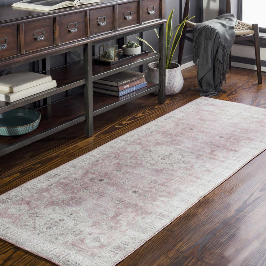 Entryway with wood floors and Bergman Distressed Red Area Rug runner, console table, chair, and plants. Roomscene-Runner
