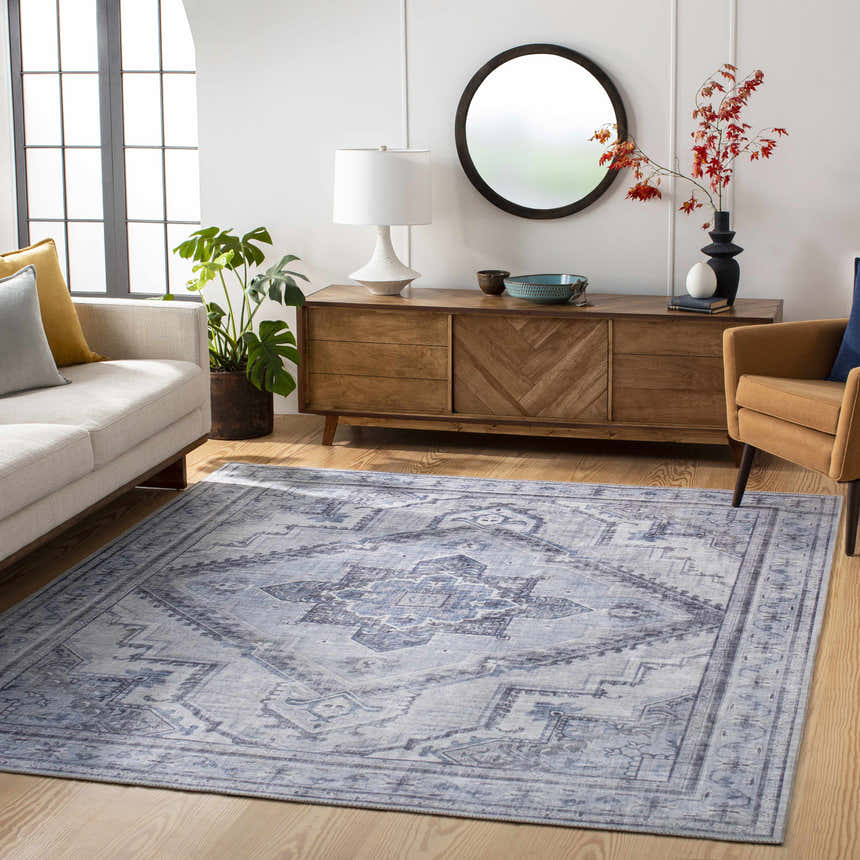 Living room scene with ivory sofa and blue Boon Area Rug. Farmhouse style with wood accents. Roomscene-Rectangle