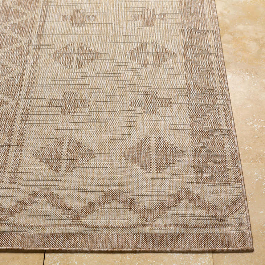 Close-up of the Mangoso Beige Area Rug showing its woven texture and geometric pattern in off-white and tan. Front