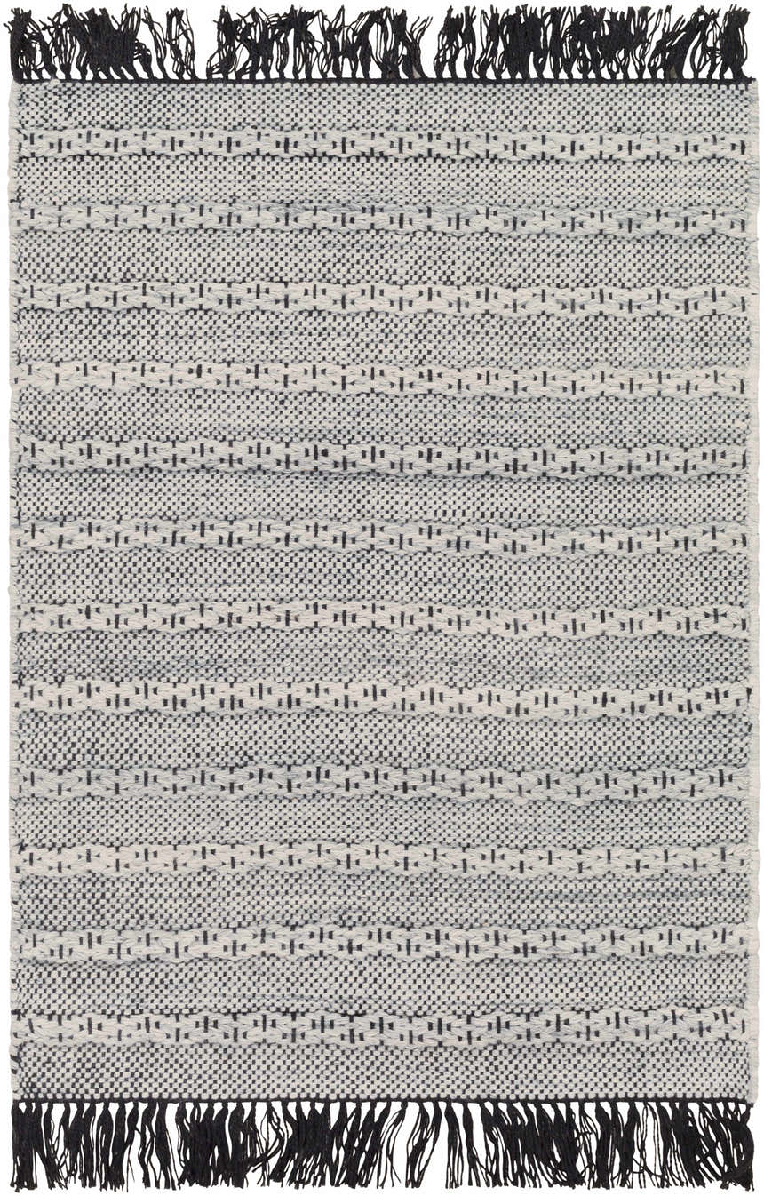 Close-up of the hand woven Brockman Area Rug. Black and off white rug with geometric pattern and black fringe. Design-Rectangle-23
