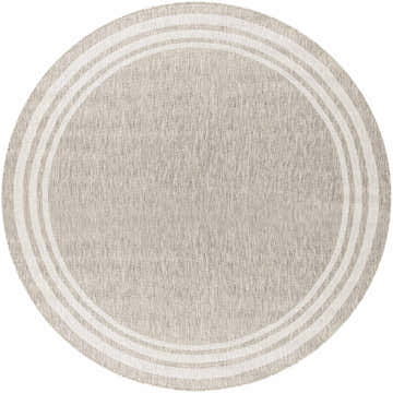 Close-up of a round Burradoo Bordered Area Rug. Oatmeal color with a concentric striped border. Machine woven polypropylene. Design-Round-710