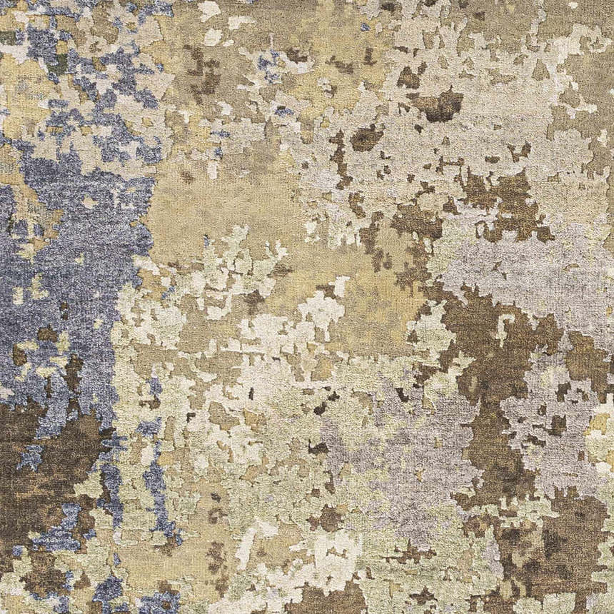 Close-up of the Bued Handmade Wool-Blend Rug. Features beige, brown, gray, and denim hues in a contemporary abstract pattern. Texture