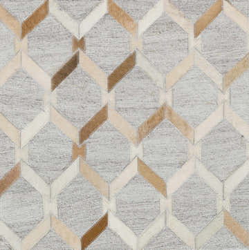 Close-up of Byng Premium Rug. Cream, light gray, tan and brown geometric pattern. Hand-crafted hair on hide texture. Swatch