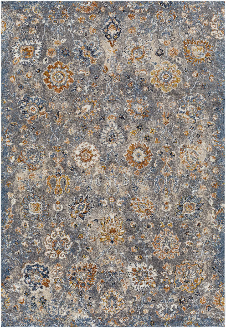 Detailed close-up of the Cogan Gray Thick Rug featuring a traditional floral pattern in gray, blue, brown, and cream hues. Design-Rectangle-5373
