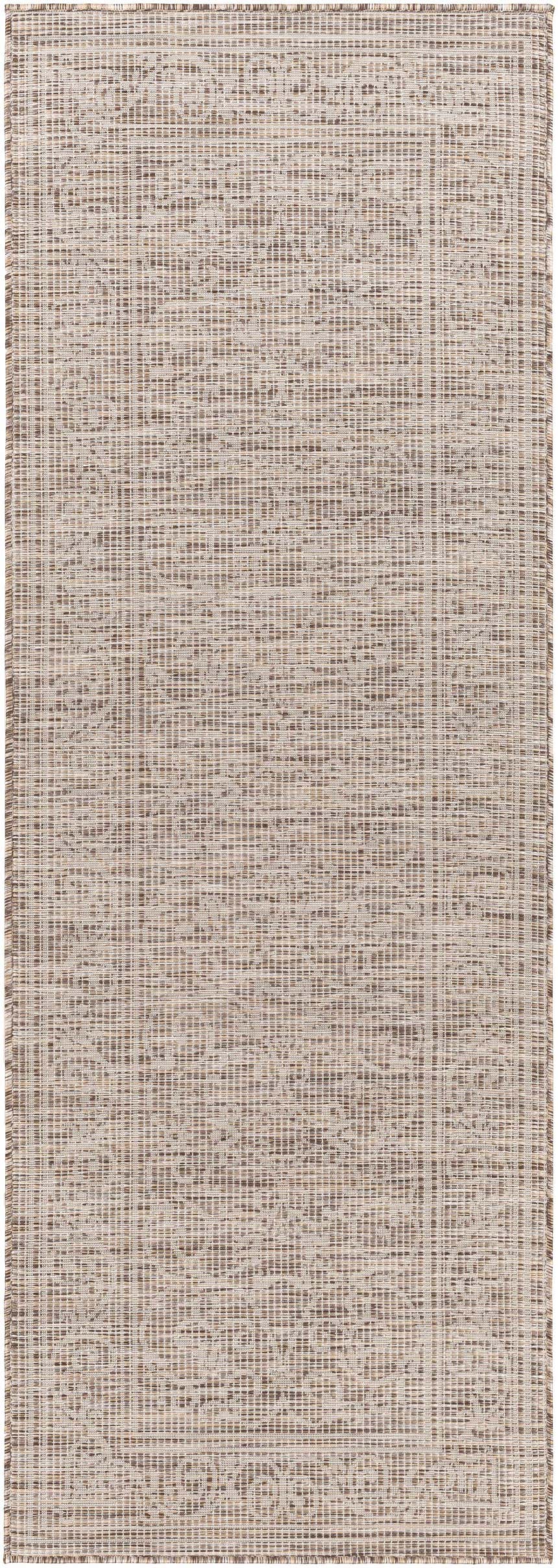 Close-up of the Coolville Brown Flatweave Area Carpet, featuring a subtle geometric pattern in brown, cream, and tan. Design-Runner