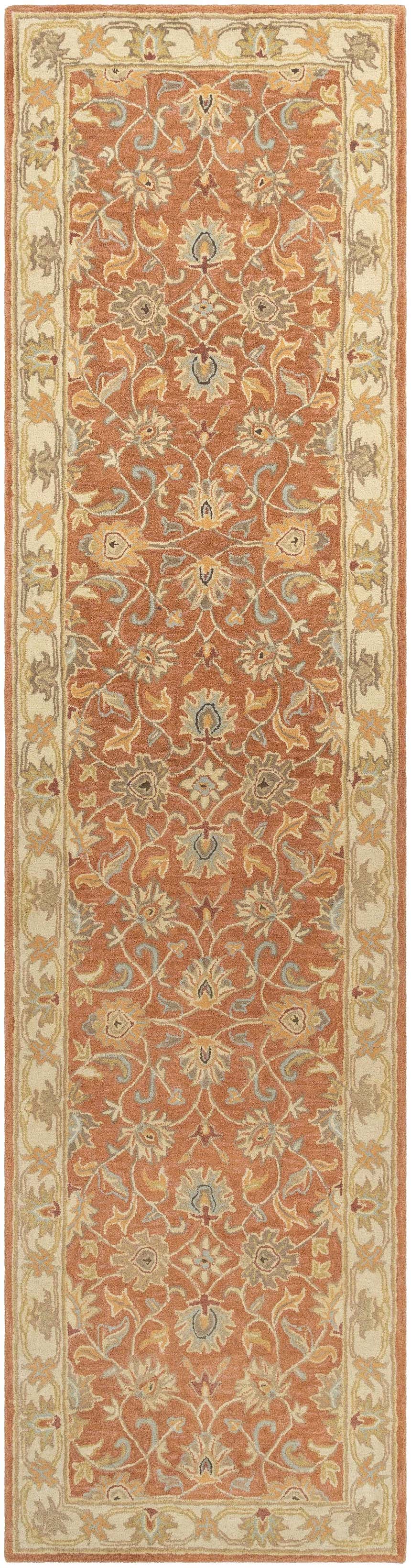 Close-up of the Caesar Hand Tufted Burnt Orange 1124 Wool Carpet. Features a floral pattern with brick red, taupe, and sky blue accents. Design-Runner-312