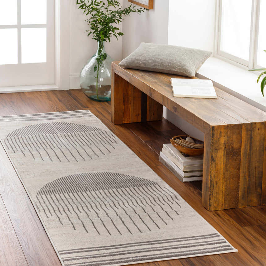 Entryway scene with Chet Area Rug runner in cloud gray with geometric design, wood bench, and natural light. Roomscene-Runner