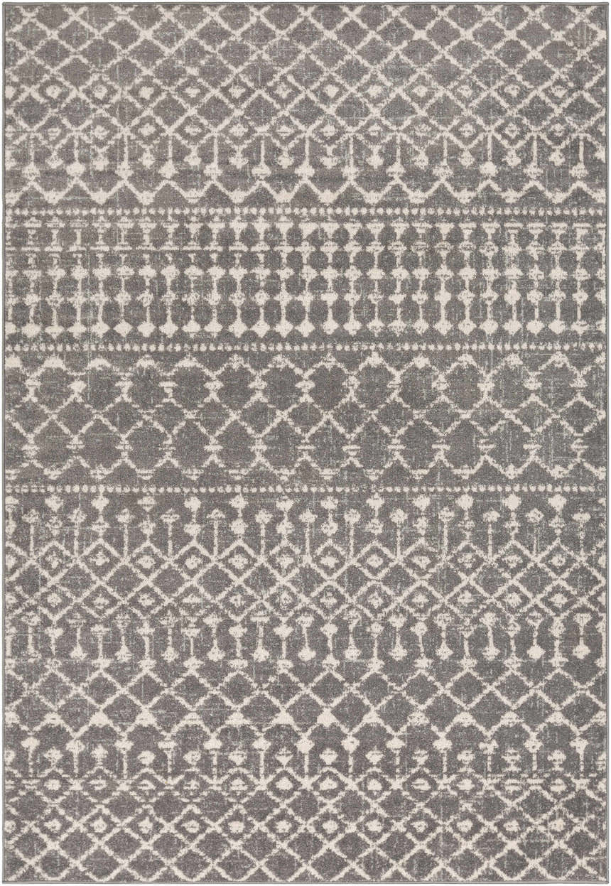 Close-up of the Cliffwood Area Rug. Charcoal gray rug with light beige geometric diamond and stripe pattern. Design-Rectangle-5373