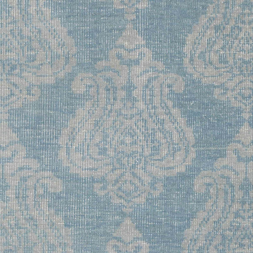 Close-up of the Clarklake Area Carpet. Blue rug with light sage traditional damask pattern, hand knotted wool texture. Swatch
