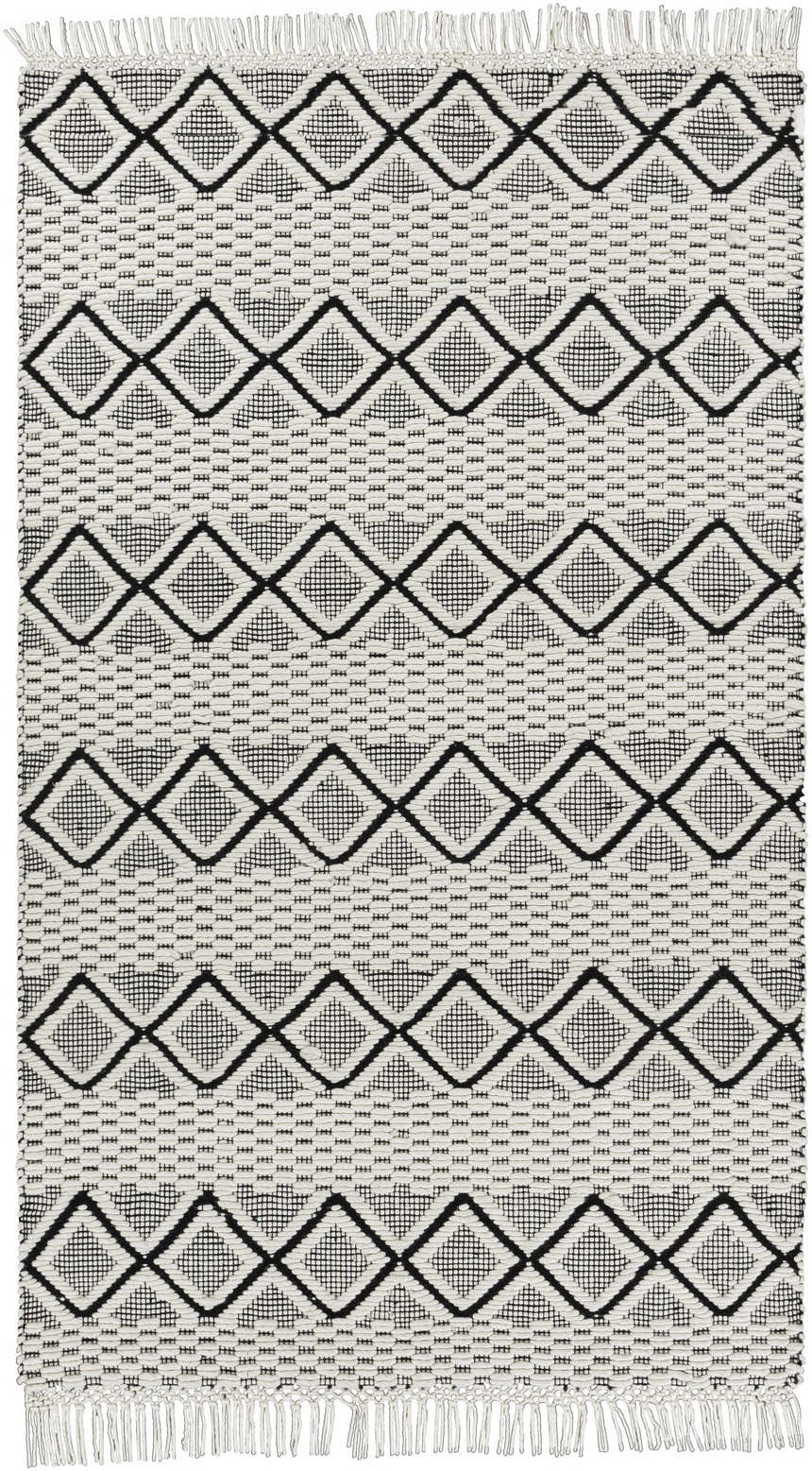 Close-up of the Cobourg Area Carpet. Black geometric diamond pattern on cream wool with fringe. Hand woven rug texture. Design-Rectangle-576