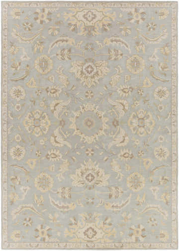 Detailed close-up of a Copen Beige Floral Wool Rug. Features a traditional beige and tan floral pattern on a pale blue background. Design-Rectangle-811