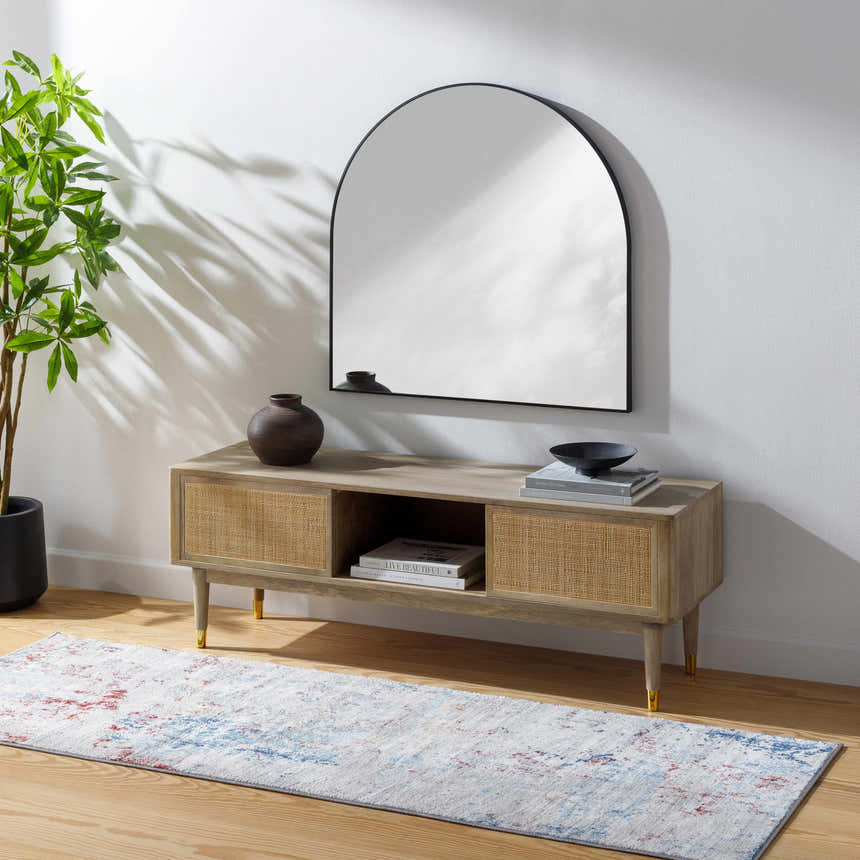 Living room scene with a Dalorong Area Carpet runner in blue, beige, gray, and red under a media console with a mirror. Roomscene-Runner