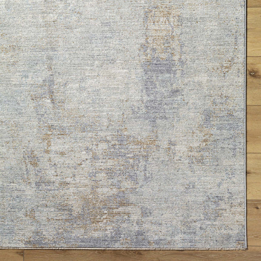 Close-up of the Deka Deep Teal Thick Luxe Rug showing its texture and colors: teal, brown, gray, and sage. Corner