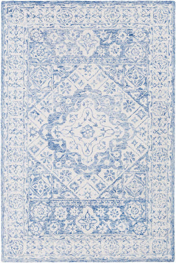 Close-up of the Devine Hand Tufted Wool Area Rug. Ice blue and ivory traditional floral pattern. Hand-tufted texture. Design-Rectangle-576