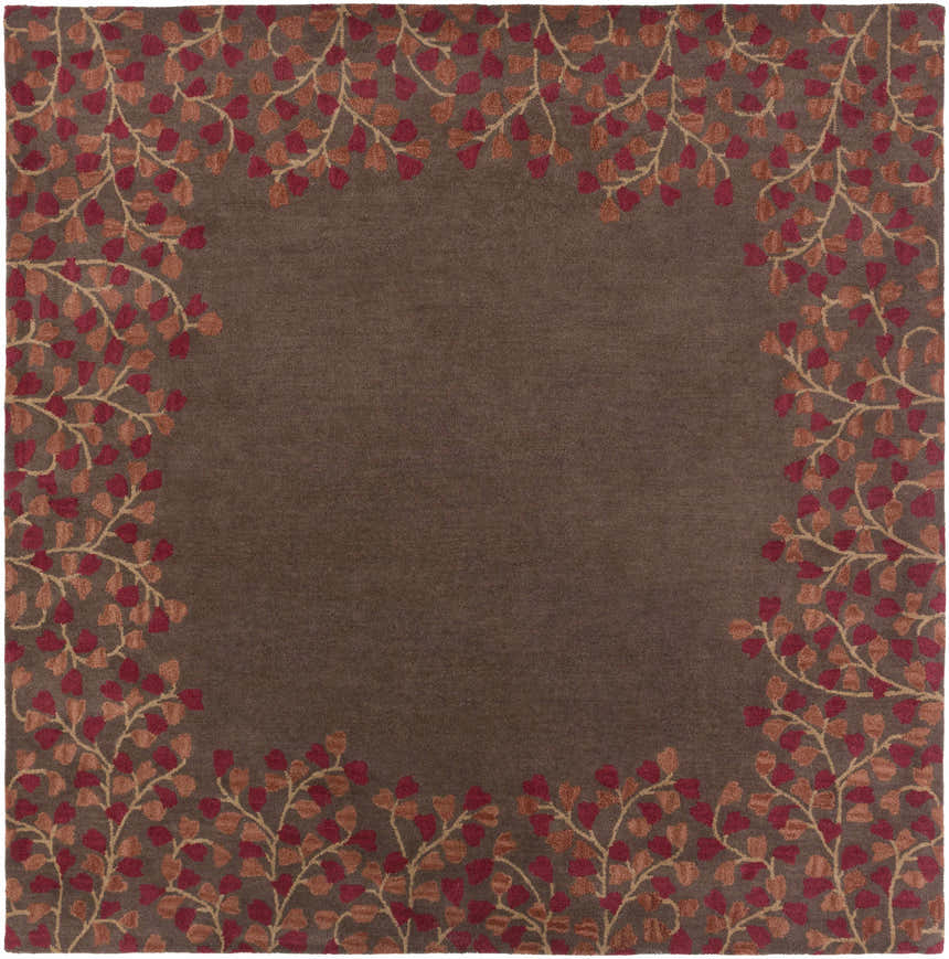Close-up of the Dovercourt Clearance Rug. Brown wool rug with a brick red and mustard leaf pattern border. Design-Square-8