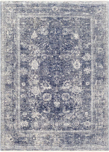 Close-up of the Eastham Luxe Area Rug. Machine-woven polyester rug in denim, light beige, and navy with a traditional oriental pattern. Design-Rectangle-582