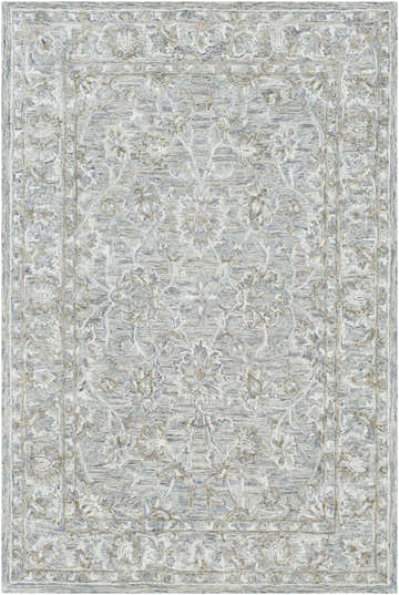 Close-up of the Eriline Wool & Faux Silk Rug. Features denim, ivory, sage, and taupe floral pattern. Hand-tufted texture. Design-Rectangle-576